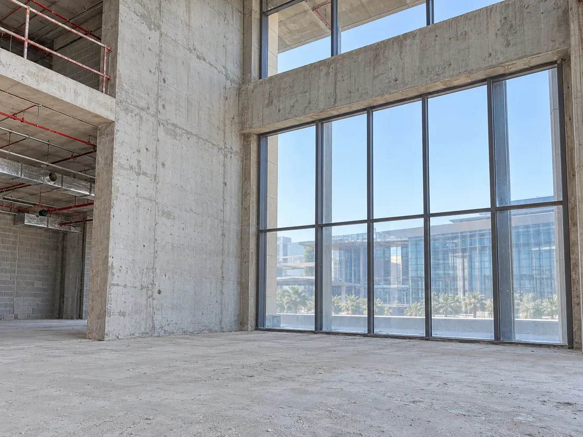 DAMAC Towers Riyadh — double-height lounge before the fit-out