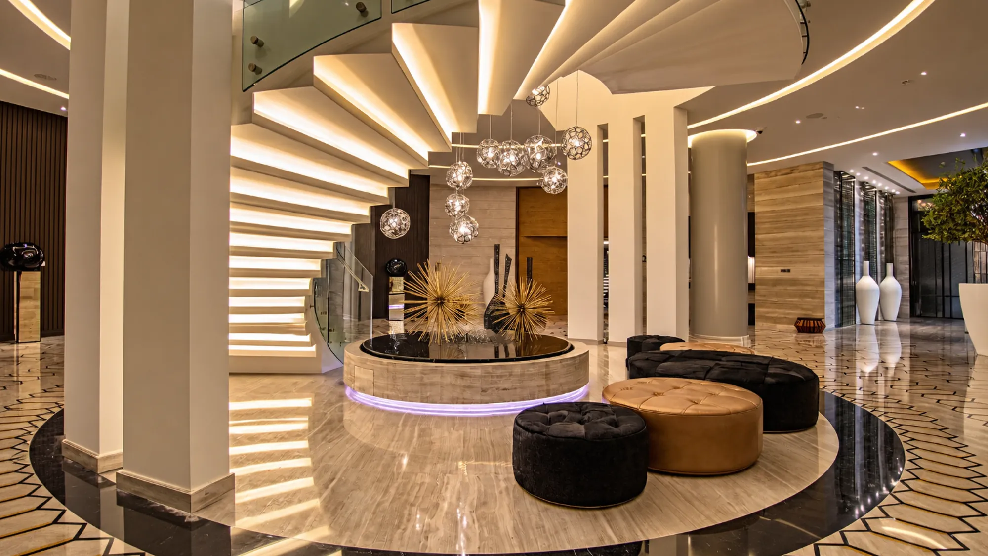 Fairmont Riyadh lobby with spiral staircase