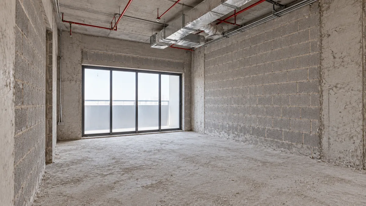 Grand Millennium Jazan — suite bedroom before the fit-out